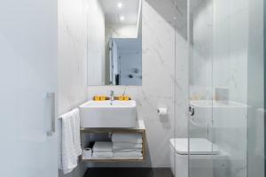 Kúpeľňa v ubytovaní Cosmo Apartments Sants + 37 fotografií