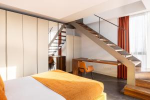 Posteľ alebo postele v izbe v ubytovaní Cosmo Apartments Sants