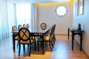 Uma área de estar em Amérian Executive Mendoza Hotel
