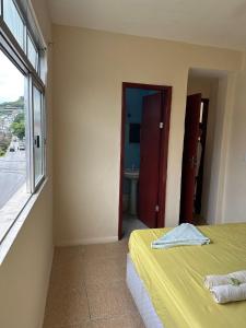 Postel nebo postele na pokoji v ubytování Hotel Pousada Angra Encanto
