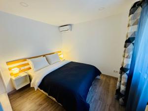 Postel nebo postele na pokoji v ubytování La Casa de Abajo