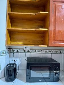 Kuchyň nebo kuchyňský kout v ubytování Master Suite Oro #4