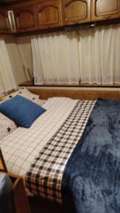 Postel nebo postele na pokoji v ubytování Caravana en La Sierra