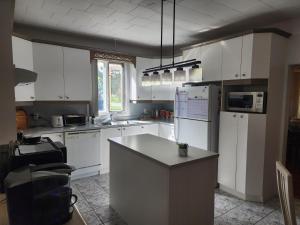 Η κουζίνα ή μικρή κουζίνα στο Havre Détente Stoneham