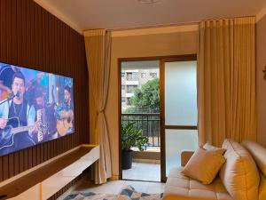 Μια τηλεόραση ή/και κέντρο ψυχαγωγίας στο Apartamento Agrishow