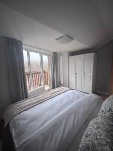 Posteľ alebo postele v izbe v ubytovaní Apartmán 11 Nová Lesná