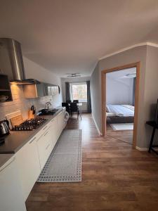 Kuchyňa alebo kuchynka v ubytovaní Apartmán 11 Nová Lesná