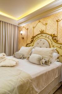 Cama ou camas em um quarto em Chocoland Hotel Gramado