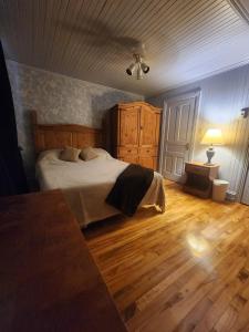 Ένα ή περισσότερα κρεβάτια σε δωμάτιο στο Havre Détente Stoneham +68 φωτογραφίες