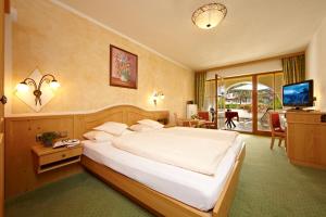 TV a/nebo společenská místnost v ubytování Hotel Schatten