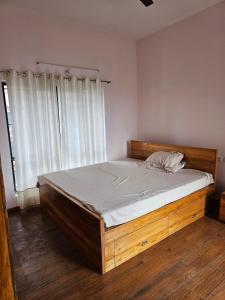Postel nebo postele na pokoji v ubytování Modern Living in Utkal