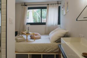 Postel nebo postele na pokoji v ubytování Cocon Classé 3 Etoiles - Love et Détente - SPA