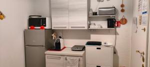 A kitchen or kitchenette at Il Centro Apartments Még 16 kép