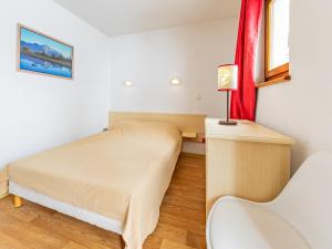 Ένα ή περισσότερα κρεβάτια σε δωμάτιο στο Appartement lumineux à St-François-Longchamp, 2 chambres, pied des pistes, 6 pers. - FR-1-807-19
