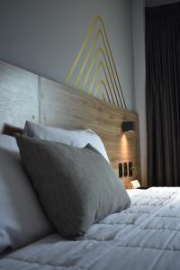 Katil atau katil-katil dalam bilik di Avanta Hotel & Villas Querétaro