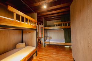 Postel nebo postele na pokoji v ubytování Isla de pascua - Jardín - Hostel