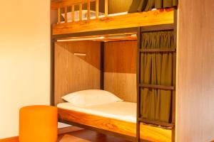 Postel nebo postele na pokoji v ubytování Isla de pascua - Jardín - Hostel