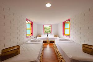 Postel nebo postele na pokoji v ubytování Isla de pascua - Jardín - Hostel + 37 fotografií