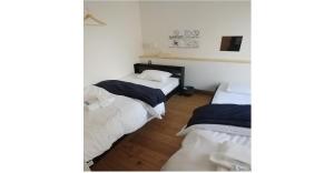 Кровать или кровати в номере Nagoya - Hotel / Vacation STAY 13460