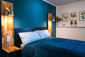 Ένα ή περισσότερα κρεβάτια σε δωμάτιο στο Magnolia Apartment im Souterrain