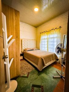 Postel nebo postele na pokoji v ubytování VillaElRemanso