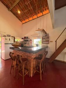 Kuchyň nebo kuchyňský kout v ubytování Hostel Caraivando