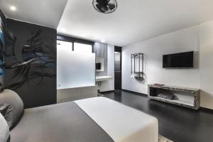 TV a/nebo společenská místnost v ubytování Graffity Hotel Med