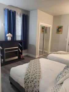 Letto o letti in una camera di Two Bedroom Serenity with AC- Complimentary Welcome Treats
