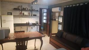 Foto de Casa no centro de Foz! Ar-condicionado, Smart Tv, Wi-fi, Cozinha, Ventilador e 4 Camas