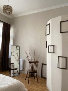 Ένα ή περισσότερα κρεβάτια σε δωμάτιο στο The Gallery Apartment