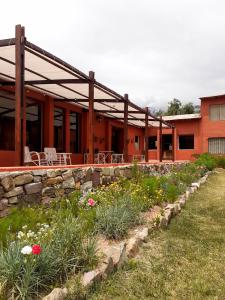 Κήπος έξω από το Hotel Punta Corral