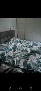 Ένα ή περισσότερα κρεβάτια σε δωμάτιο στο Lelystad appartement