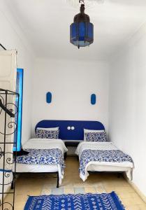 Postel nebo postele na pokoji v ubytování Riad Safi - maison historique