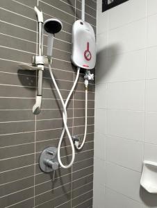 Ένα μπάνιο στο 026 Palazio Apartment Muji House Mount Austin Wifi Netflix