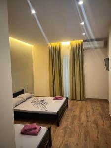 Postel nebo postele na pokoji v ubytování Hotel Nuanti