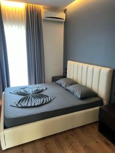 Postel nebo postele na pokoji v ubytování Hotel Nuanti