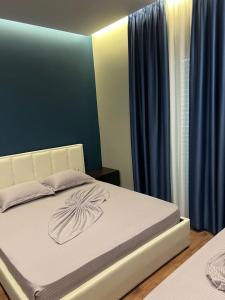 Postel nebo postele na pokoji v ubytování Hotel Nuanti
