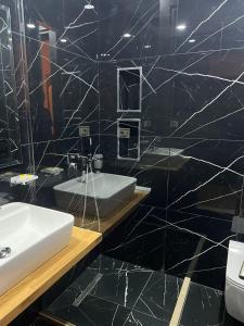 Koupelna v ubytování Hotel Nuanti