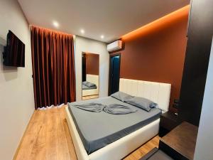 Postel nebo postele na pokoji v ubytování Hotel Nuanti