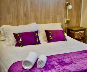 Postel nebo postele na pokoji v ubytování Departamentos Patagonia