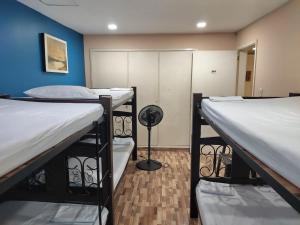 Postel nebo postele na pokoji v ubytování Hostal Avanza + 37 fotografií