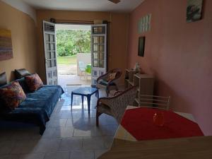 Posezení v ubytování Le petit coin tranquille