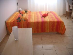 Posteľ alebo postele v izbe v ubytovaní Apartments Tamarix