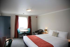 Postel nebo postele na pokoji v ubytování Bella Vista Motel Hamilton