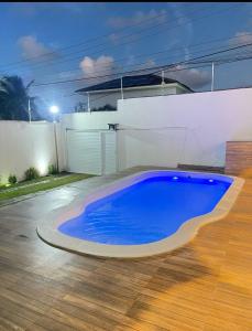 Bazén v ubytování Mansão Climatizada com piscina e churrasqueira nebo v jeho okolí