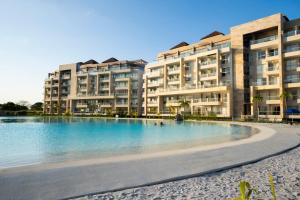 Πισίνα στο ή κοντά στο Apartamento con laguna de aguas cristalinas