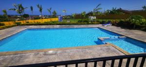 The swimming pool at or close to A serene getaway by the oasis