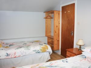 Letto o letti in una camera di Ceol Na N'ean