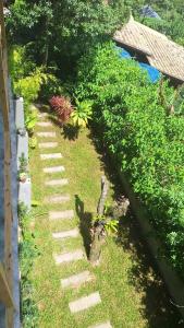 En have udenfor Pousada Rosa Bonita