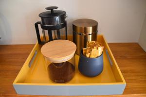 a tray with a coffee maker and a coffee pot at 73 Milton Accommodation in Cambridge +15 photos